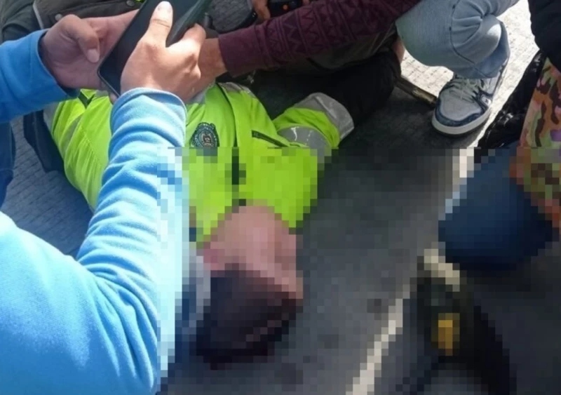Auxiliar de Policía cayó de estación de TransMilenio - Cortesía